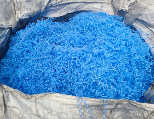 Blue plastic scrap waste collected for recycling