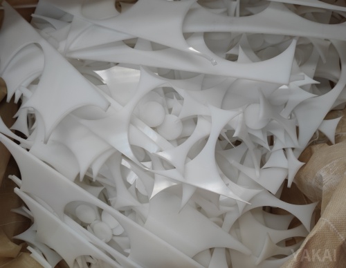 White plastic off-cuts and waste collected for recycling